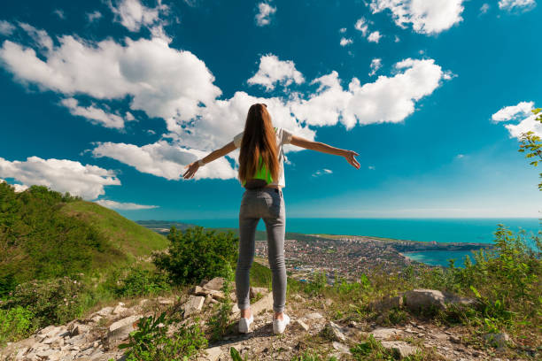istock Woman  in view Black sea, back 1174424513