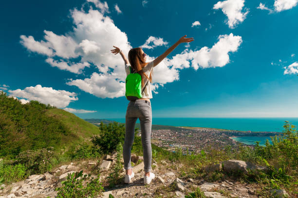 istock Woman  in view Black sea, back 1174424646