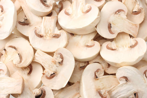 istock Sliced mushrooms as background texture. healthy food 1174427057
