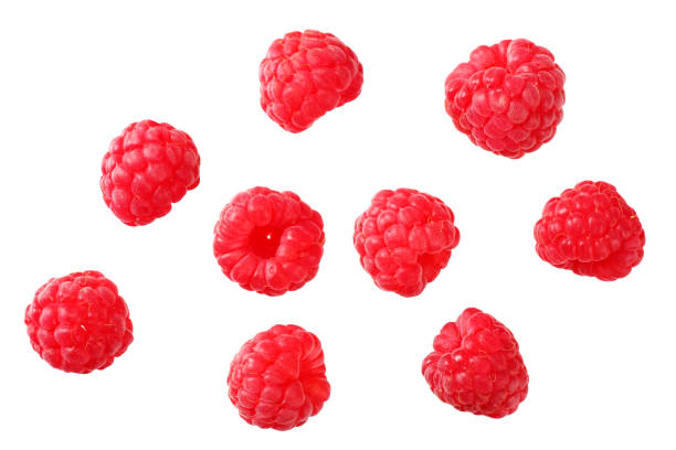istock ripe raspberries isolated on white background. top view 1174430334