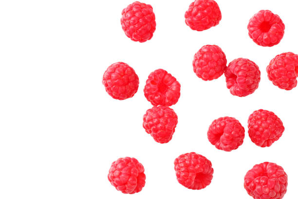 istock ripe raspberries isolated on white background. top view 1174430348