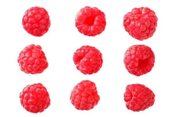 istock ripe raspberries isolated on white background. top view 1174430403