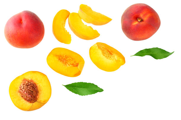 istock peach fruit with green leaf and slices isolated on white background. top view 1174433297