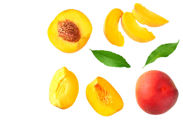 istock peach fruit with green leaf and slices isolated on white background. top view 1174433316