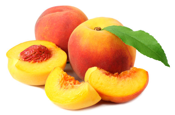 istock peach fruit with green leaves and slices isolated on white background 1174433332
