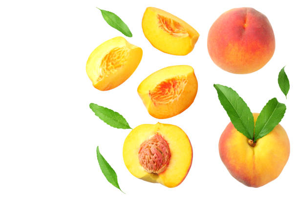 istock peach fruit with green leaf and slices isolated on white background. top view 1174433343