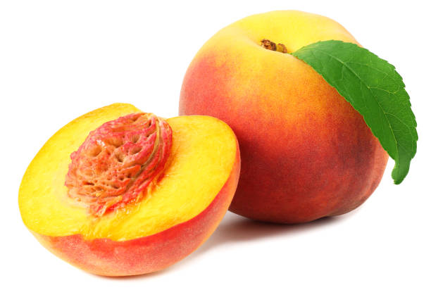 istock peach fruit with green leaves and slices isolated on white background 1174433377