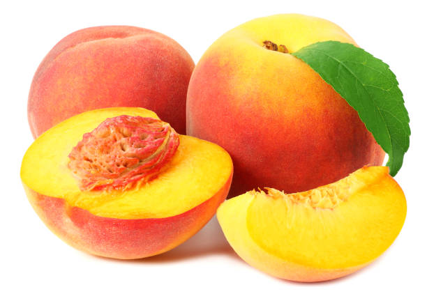 istock peach fruit with green leaves and slices isolated on white background 1174433499