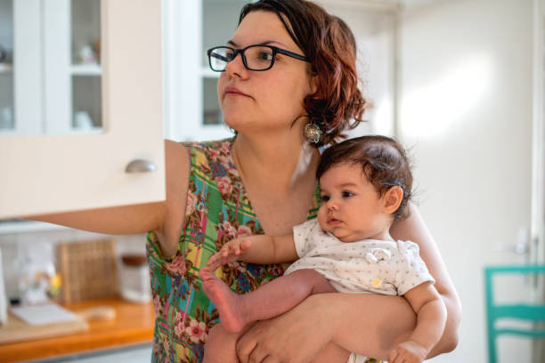 istock Mother preparing lunch for her baby 1174433520