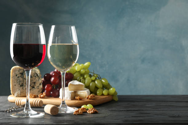 istock Grape, cheese, corkscrew, glasses with wine, on wooden background, copy space 1174433883