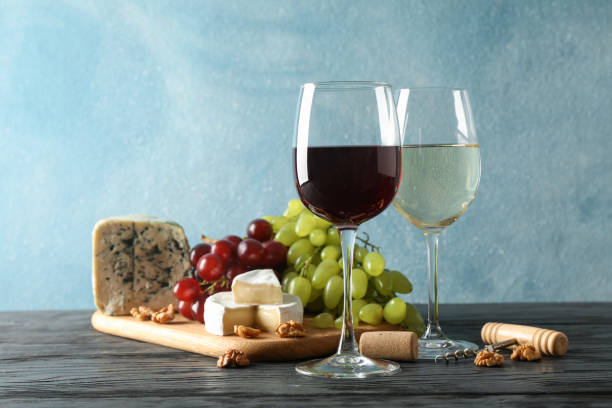 istock Grape, cheese, corkscrew, glasses with wine, on wooden background, copy space 1174433895