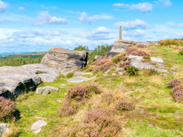 istock Rugged gritstone rocks lead up to Nelsons monument - HDR image 1174434704