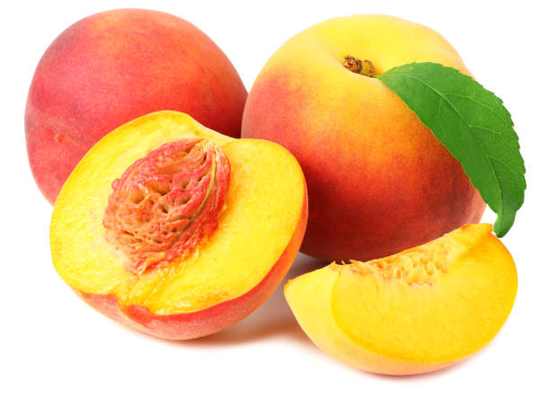 istock peach fruit with green leaves and slices isolated on white background 1174434978