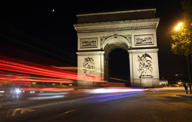 istock Arc de Triomphe at night in Paris, France 1174435092