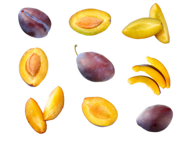 istock fresh plum fruit with cut plum slices isolated on white background. top view 1174435189