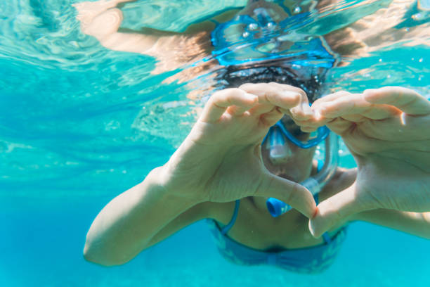 istock Snorkeling and having fun in the sea 1174436931