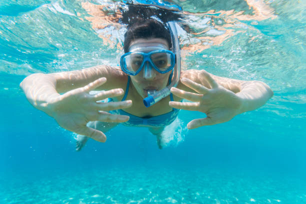 istock Snorkeling and having fun in the sea 1174437004