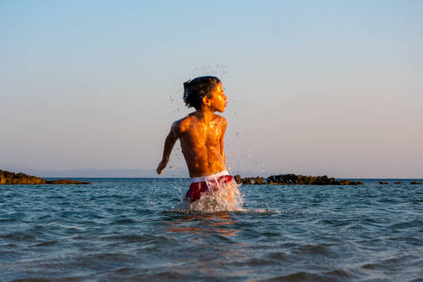 istock Boy Summer fun on the sea 1174437210