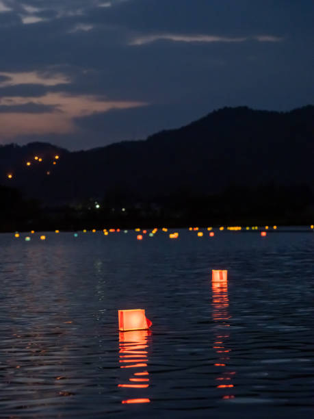 istock Floating of lanterns on the water 1174437357