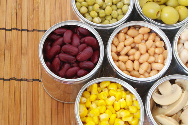 istock Canned food on bamboo mat background 1174438239
