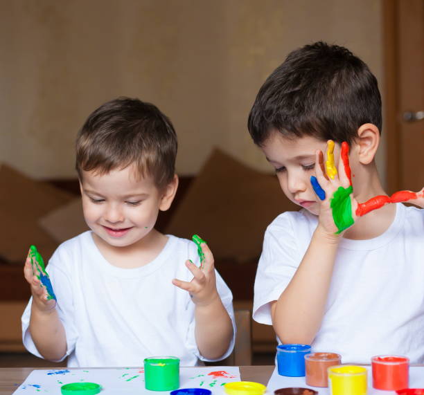 istock Face, painted, hands, white t-shirt 1174438278