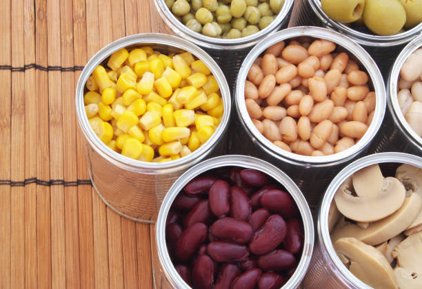 istock Canned food on bamboo mat background 1174438361