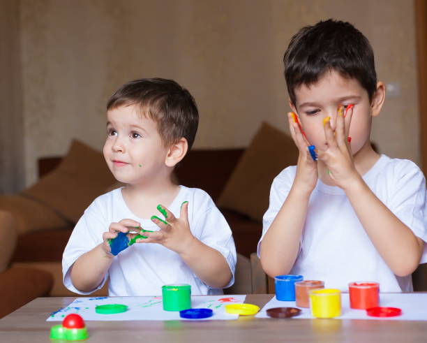 istock Face, painted, hands, white t-shirt 1174438614