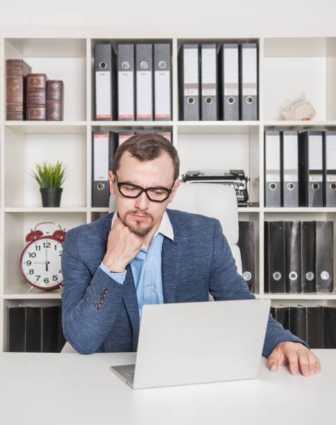 istock Business man boss working in office 1174438722