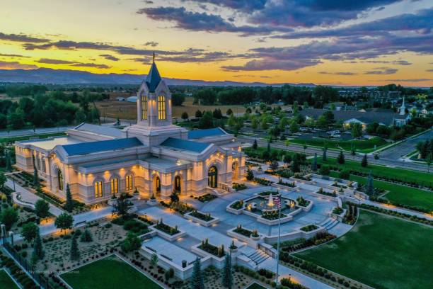 The Fort Collins Colorado Temple is seen here at dusk with the exterior lights on.