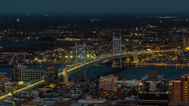 Aerial view of Delaware River and Benjamin Franklin Bridge View of Delaware River and Benjamin Franklin Bridge from Liberty Tower Observation Desk liberty tower stock pictures, royalty-free photos & images