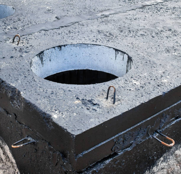 istock Manhole in the concrete block 1174447069
