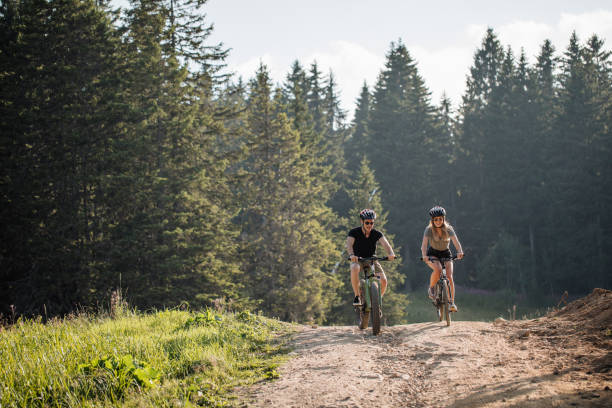 istock Cycling is more fun in two 1174450304