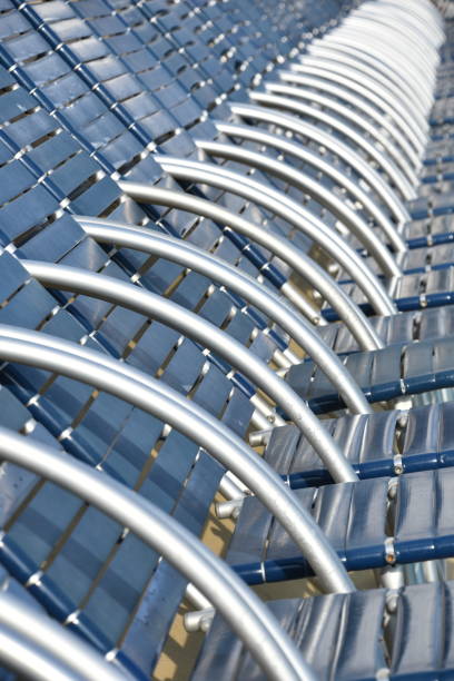 istock Empty sun loungers on deck of ship 1174457898