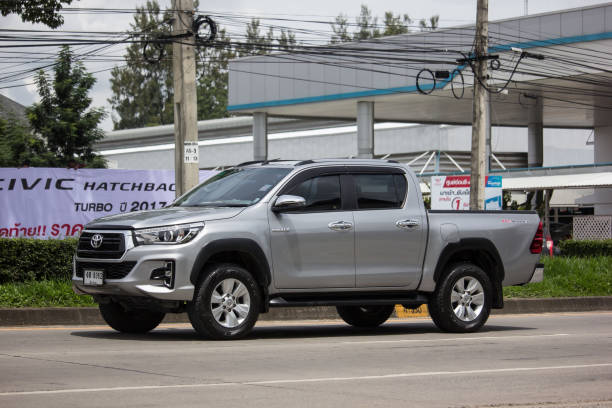 Private Pickup Truck Car Toyota Hilux Revo Chiangmai, Thailand - August 29 2019:  Private Pickup Truck Car Toyota Hilux Revo. On road no.1001, 8 km from Chiangmai city. toyota hilux stock pictures, royalty-free photos & images
