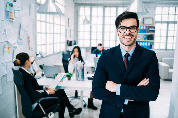 istock White collar worker with eyeglasses in office 1174459618