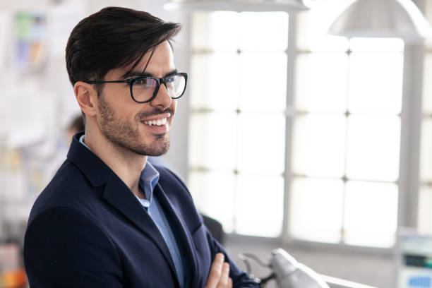 istock White collar worker with eyeglasses in office 1174459635