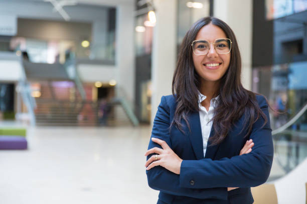 istock Young businesswoman smiling at camera 1174461475