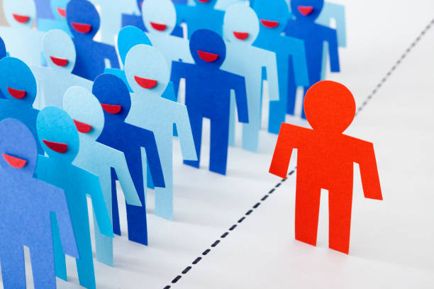 istock Red man next to happy blue men 1174462098