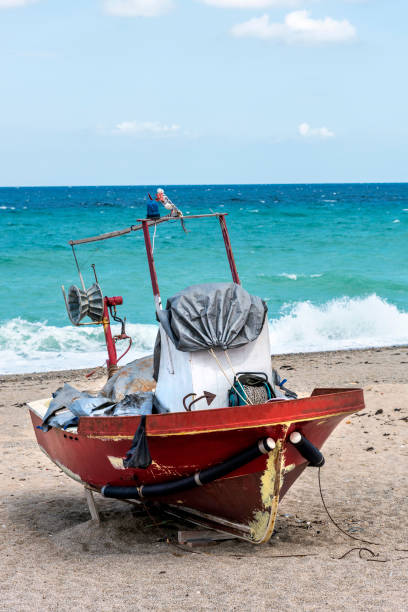 istock Fishing boat pulled up for maintenance in Turkey 1174463499