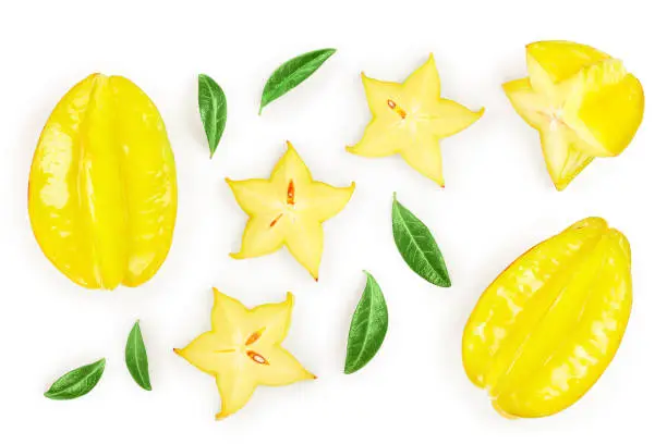 Carambola or star-fruit with leaf isolated on white background. Top view. Flat lay.