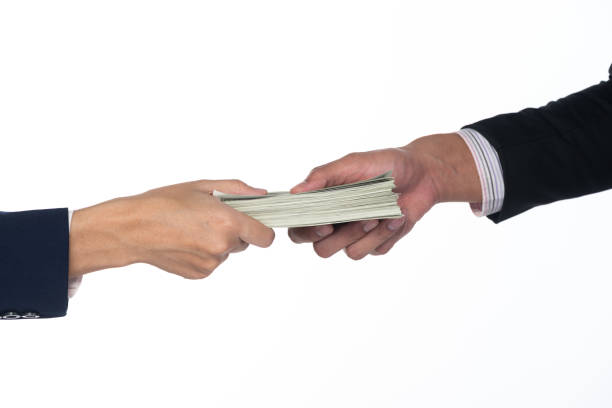 istock money transfer concept, business people isolated on white 1174467746