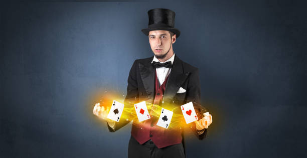 istock Illusionist making trick with magical play cards 1174469051