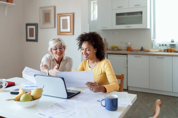 istock Helping mom with some of her home finances 1174469986
