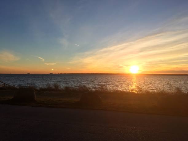 istock The sunset and the ocean 1174470005