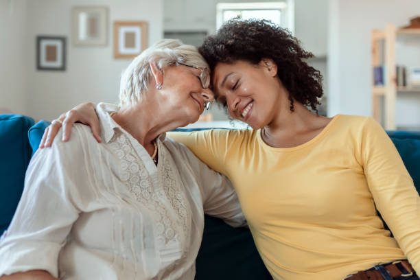 istock Smiling elderly woman and her daughter 1174470576