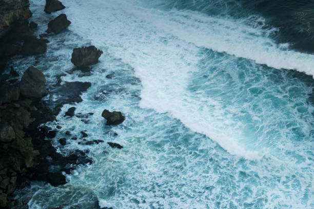istock Breaking blue wave in bali, indonesia 1174470724