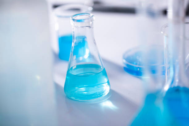 istock scientist with equipment and science experiments ,laboratory glassware containing chemical liquid for design or decorate science or other your content and selective focus 1174472184