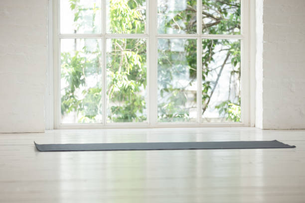 istock Light studio yoga class room picturesque view seen from window 1174472481