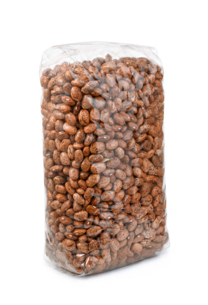Pinto bean packet Pinto bean packet isolated on white bean stock pictures, royalty-free photos & images