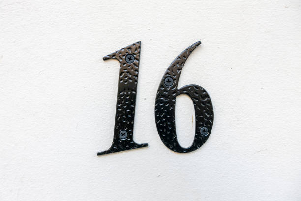 istock Street number sign on the wall 1174473290